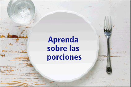 Vaso con agua, plato y tenedor